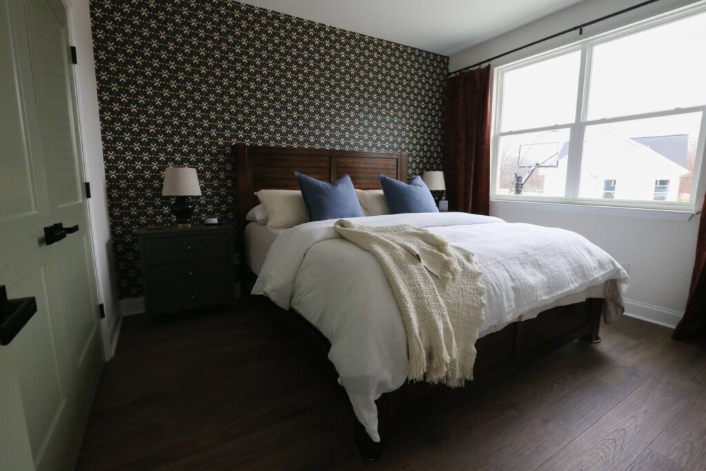 dark and moody king bed for airbnb guest comfort